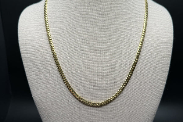Solid gold Cuban link chain, the anchor piece for layering