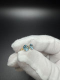 6mm 14k Yellow Gold Blue Topaz Studs .65g