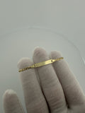 5.5 inch 2.5mm curb baby ID bracelet in 14K yellow gold, 1.81g, view 4 - Ott Family Jewelry