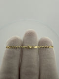 5.5 inch 2.5mm curb baby ID bracelet in 14K yellow gold, 1.81g, view 5 - Ott Family Jewelry