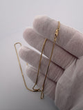 20 inch 1.5mm snake chain in 14K yellow gold, 2.4g, view 5 - Ott Family Jewelry