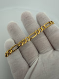 7.75" 14K Yellow Gold Figaro 6.5mm 9.4g