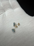 6mm 14k Yellow Gold Blue Topaz Studs .65g